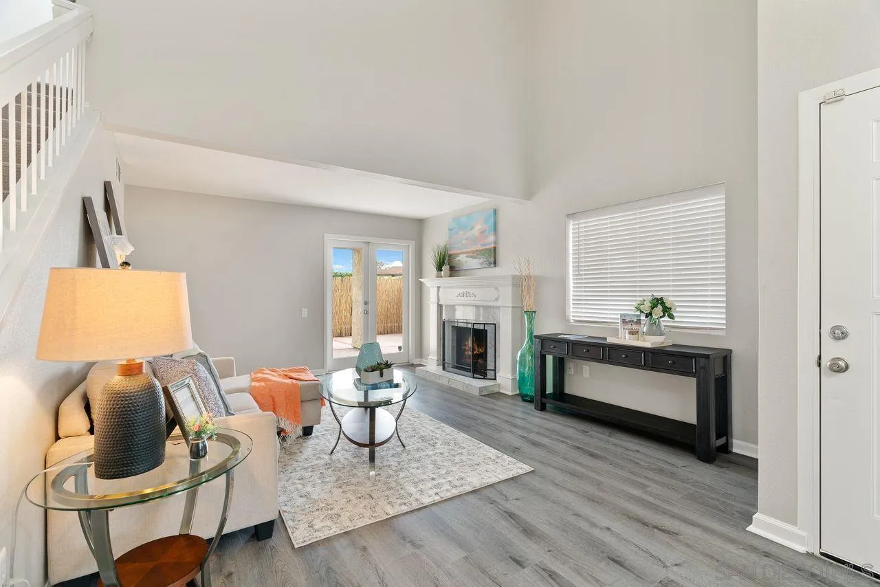 4765 Adler Way Oceanside, CA 92057 - Photo 6 of 33 a living room with furniture and a wooden floor