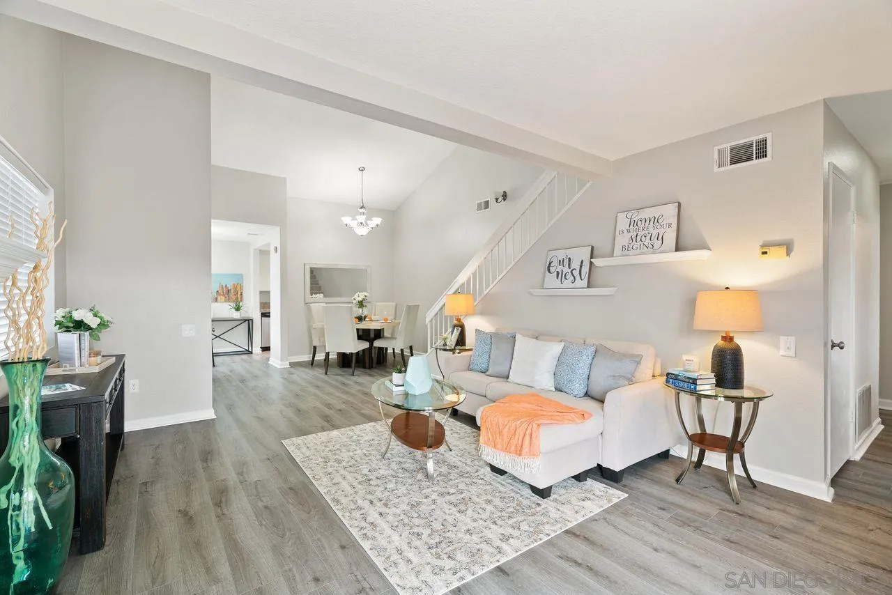 4765 Adler Way Oceanside, CA 92057 - Photo 8 of 33 a bed room with furniture and wooden floor