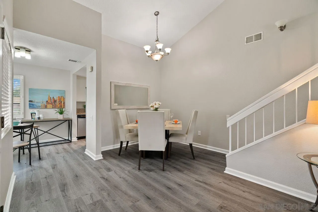 4765 Adler Way Oceanside, CA 92057 - Photo 9 of 33 a living room with furniture and a wooden floor