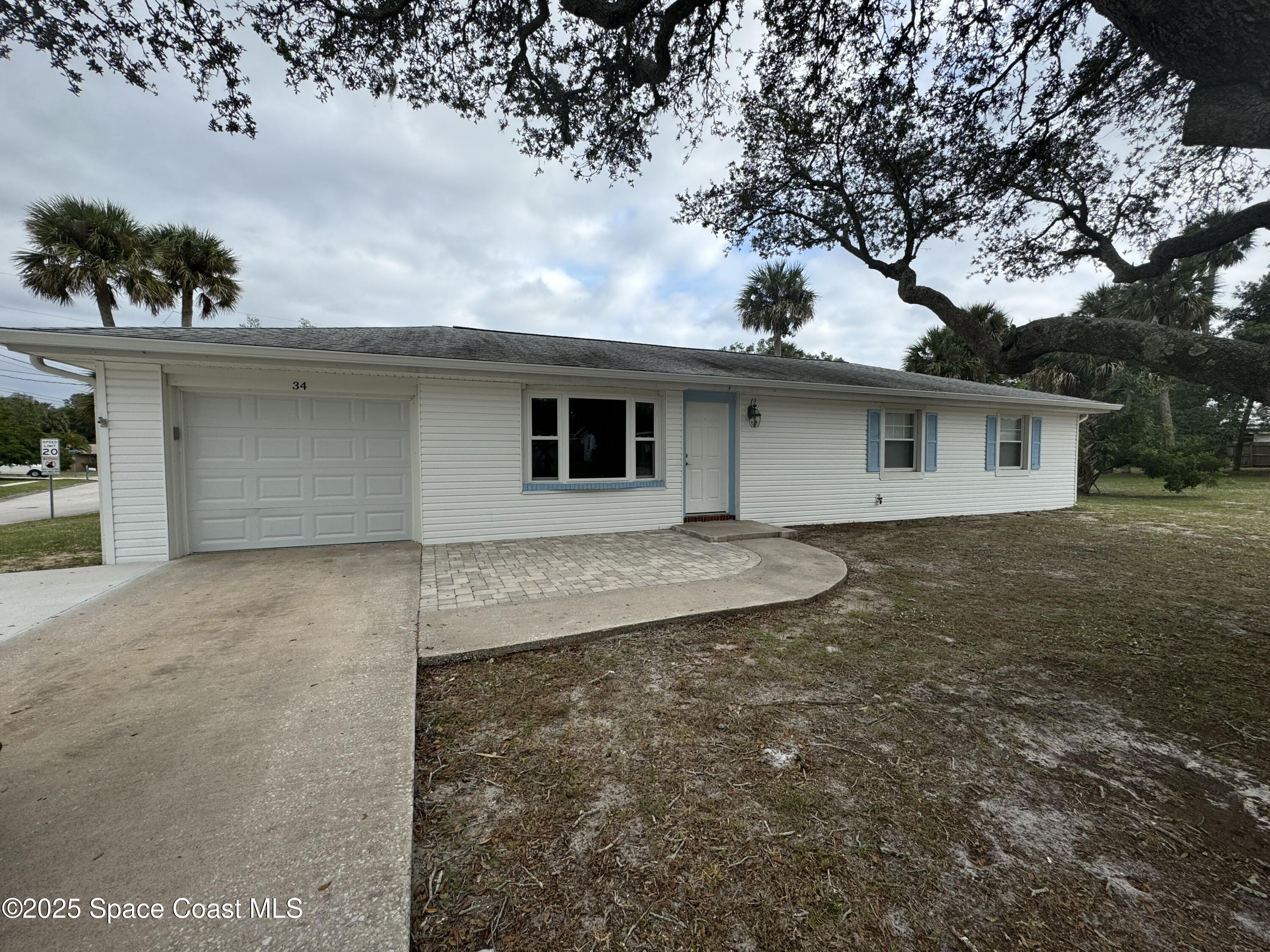 34 East Azalea Circle Rockledge, FL 32955 - Photo 1 of 11 a view of a house with a backyard