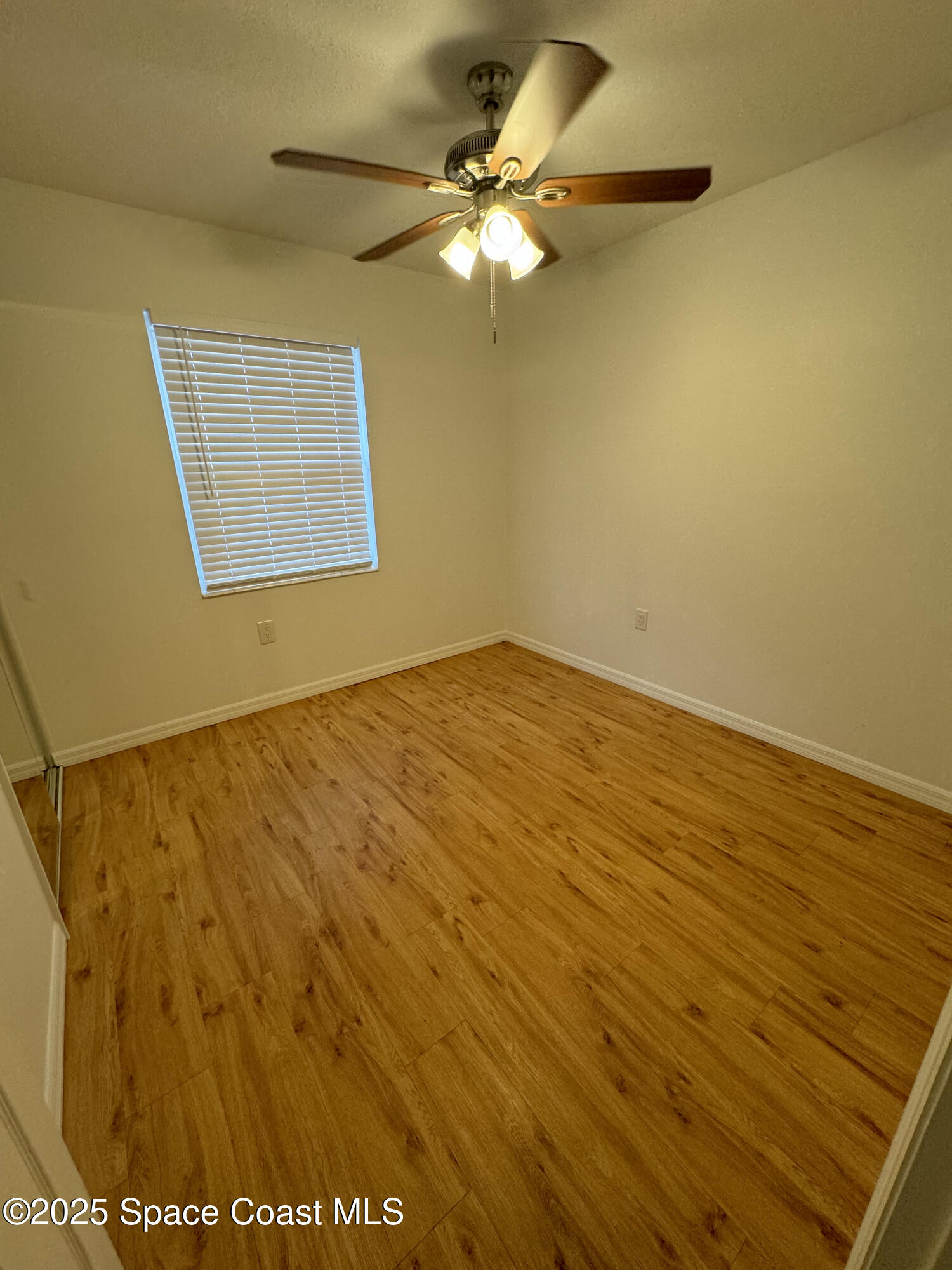 34 East Azalea Circle Rockledge, FL 32955 - Photo 6 of 11 a view of an empty room