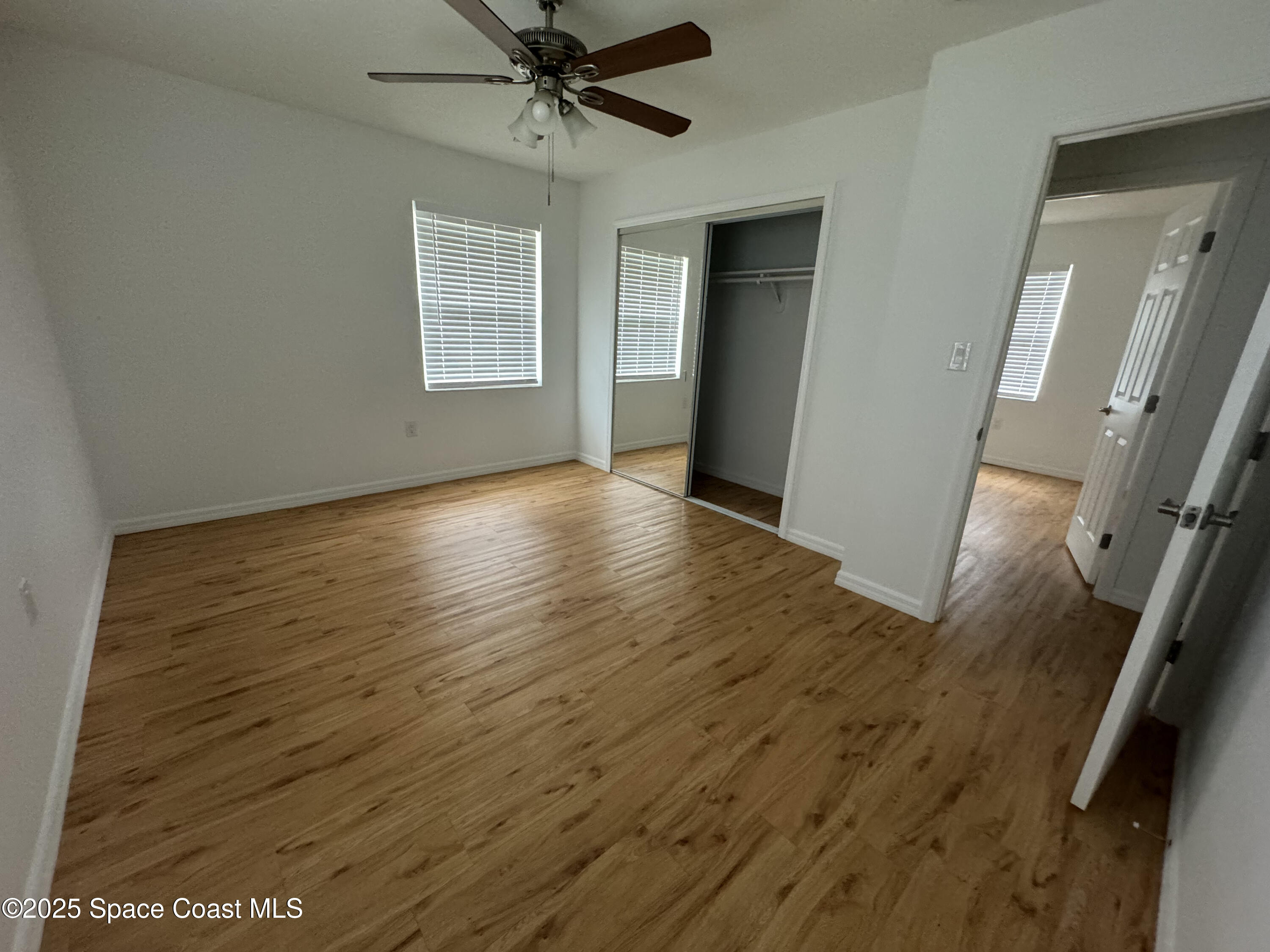 34 East Azalea Circle Rockledge, FL 32955 - Photo 8 of 11 a view of an empty room with a window