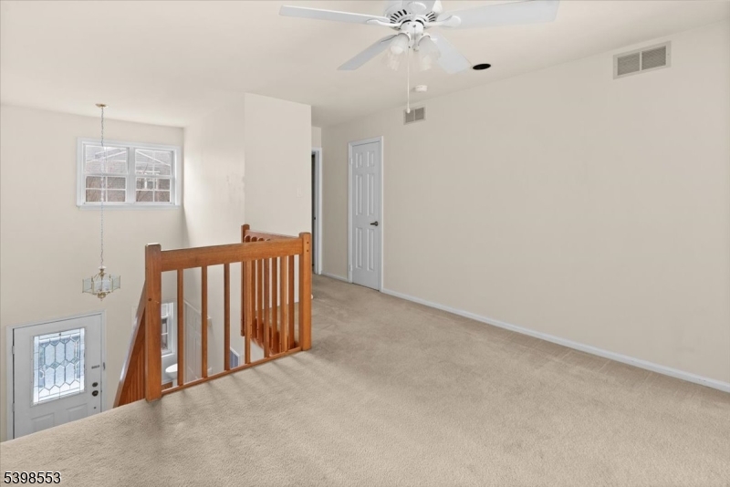 36 Needham Way, Unit D Princeton, NJ 08540 - Photo 18 of 30 a view of a hallway with windows