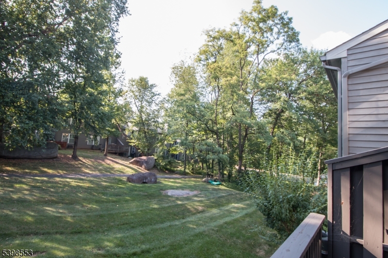 36 Needham Way, Unit D Princeton, NJ 08540 - Photo 3 of 30 a backyard of a house with lots of green space