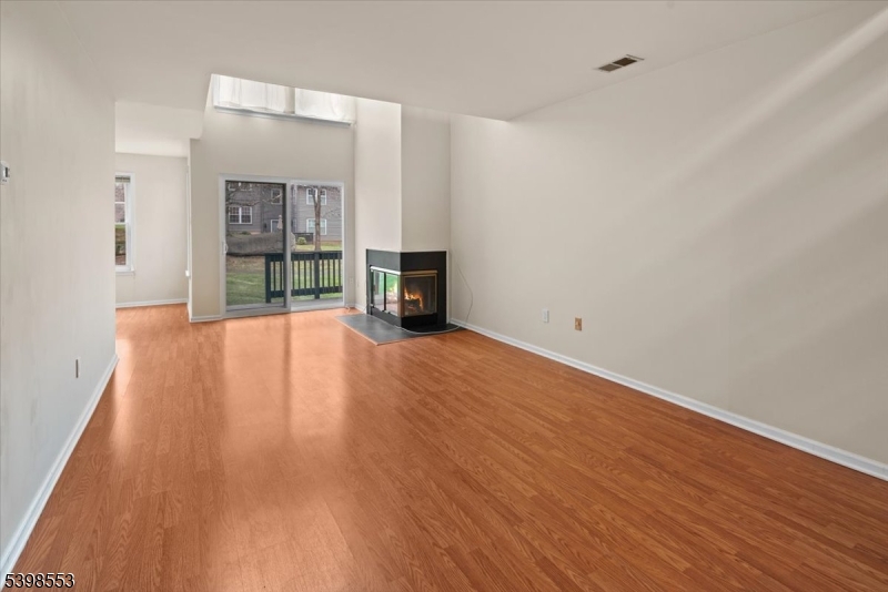36 Needham Way, Unit D Princeton, NJ 08540 - Photo 8 of 30 a view of empty room with wooden floor
