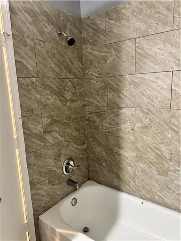 a bathroom with a bathtub