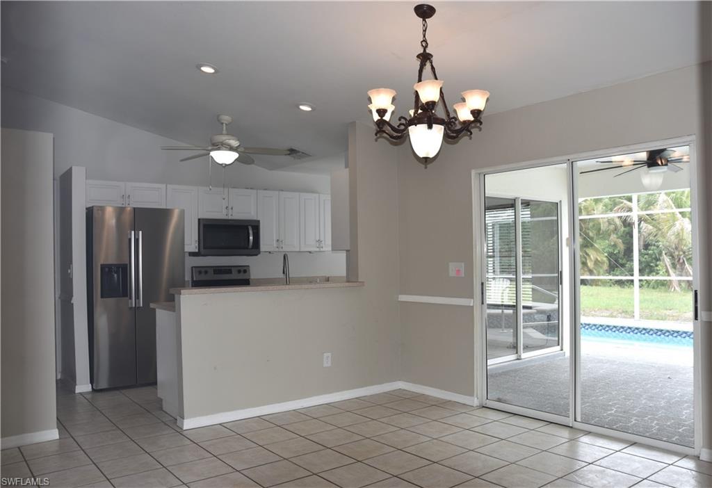 7240 Coolidge Road Fort Myers, FL 33967 - Photo 7 of 30 Kitchen opens to dining area