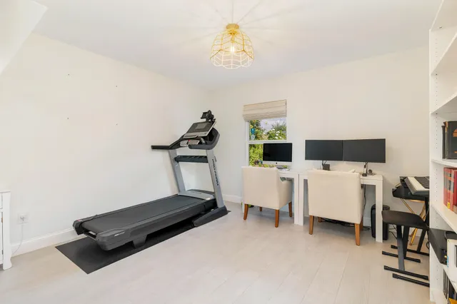 a room with furniture and a window