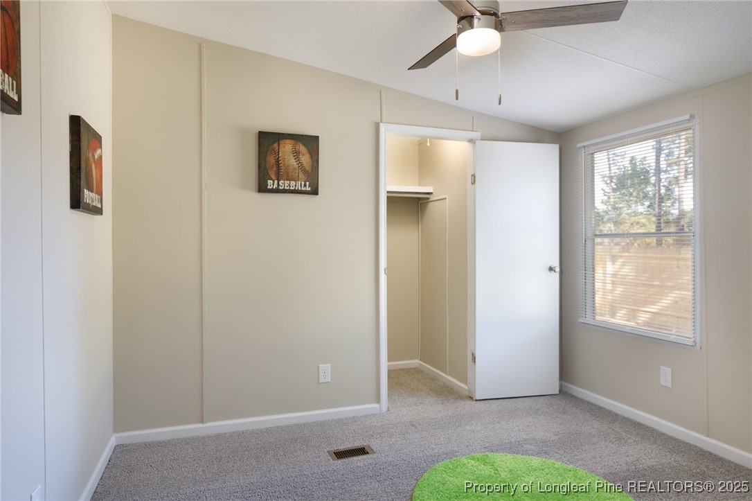 212 Heflin Road Aberdeen, NC 28315 - Photo 15 of 23 a view of an empty room with a window