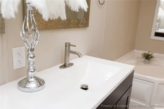 a close view of dining table with chairs