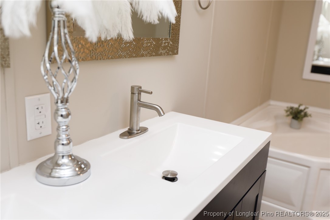 212 Heflin Road Aberdeen, NC 28315 - Photo 19 of 23 a close view of dining table with chairs