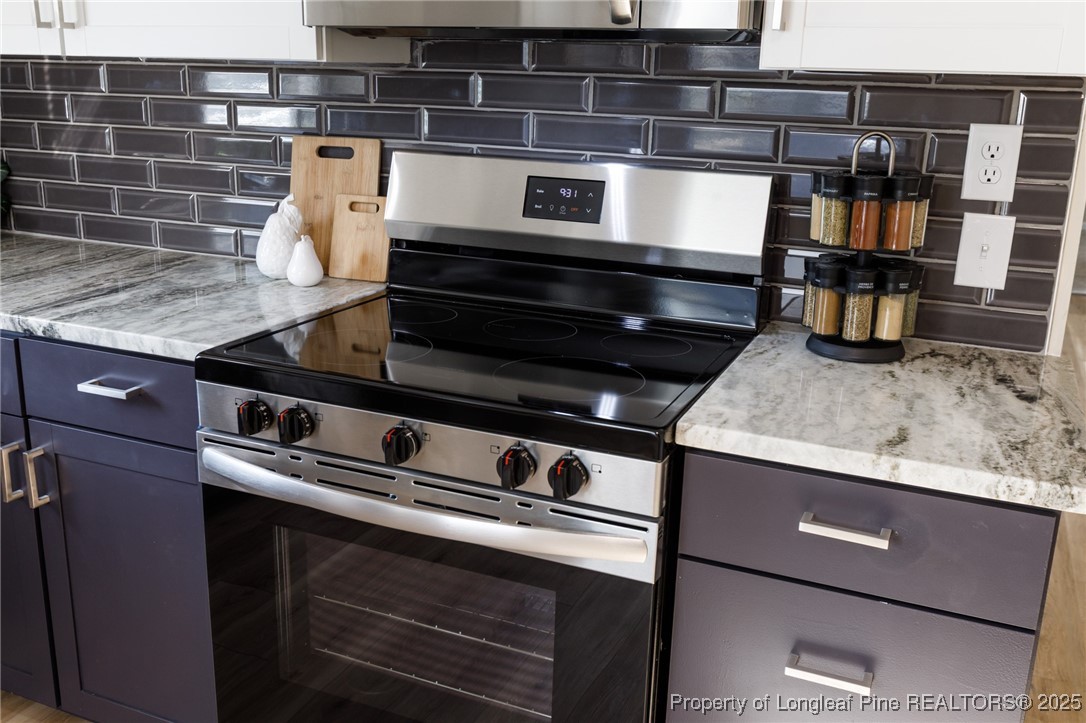 212 Heflin Road Aberdeen, NC 28315 - Photo 8 of 23 a close view of stove