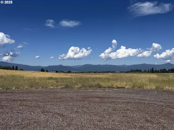 a view of a house with a lake view
