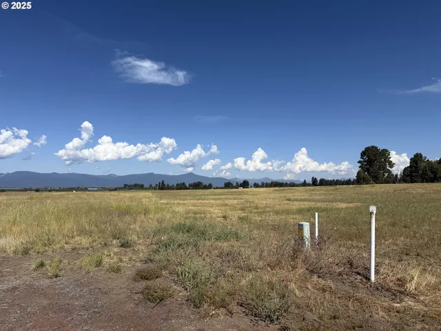 a view of a lake with sunset