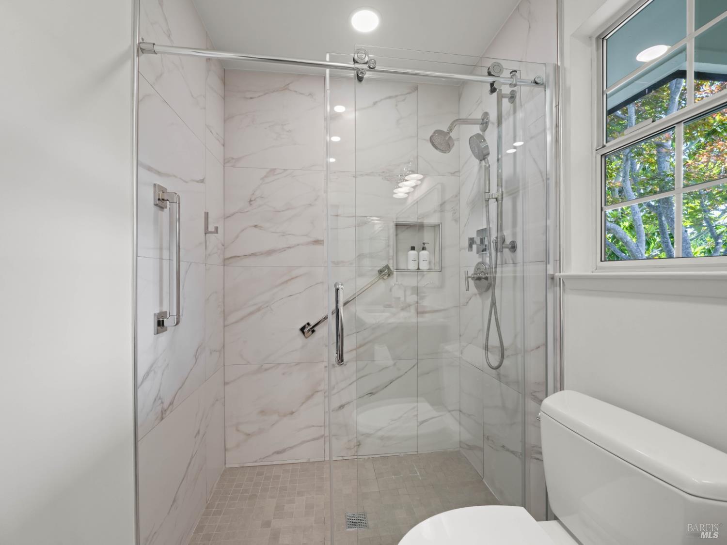 148 Dominican Drive San Rafael, CA 94901 - Photo 33 of 60 a bathroom with a shower and toilet