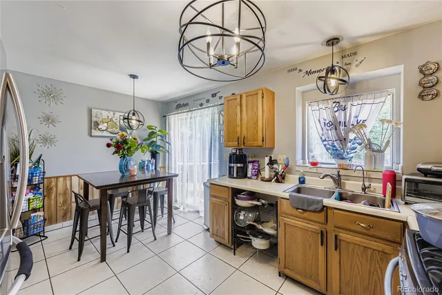 a table and a vase with flowers on it