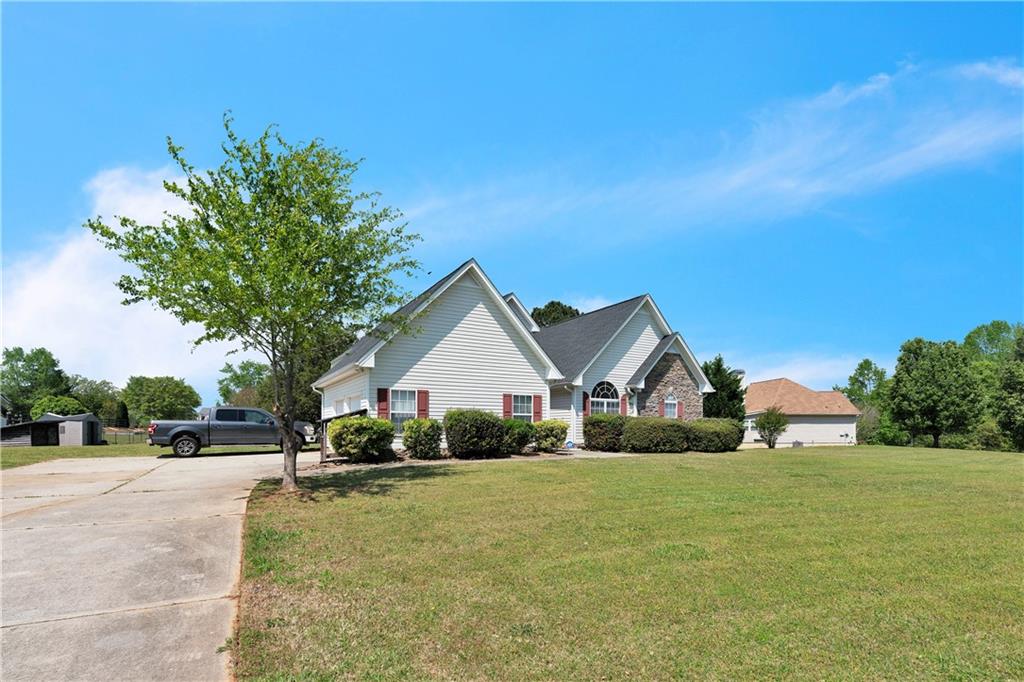 152 Ridge Crossing Temple, GA 30179 - Photo 1 of 1 a view of house and outdoor space