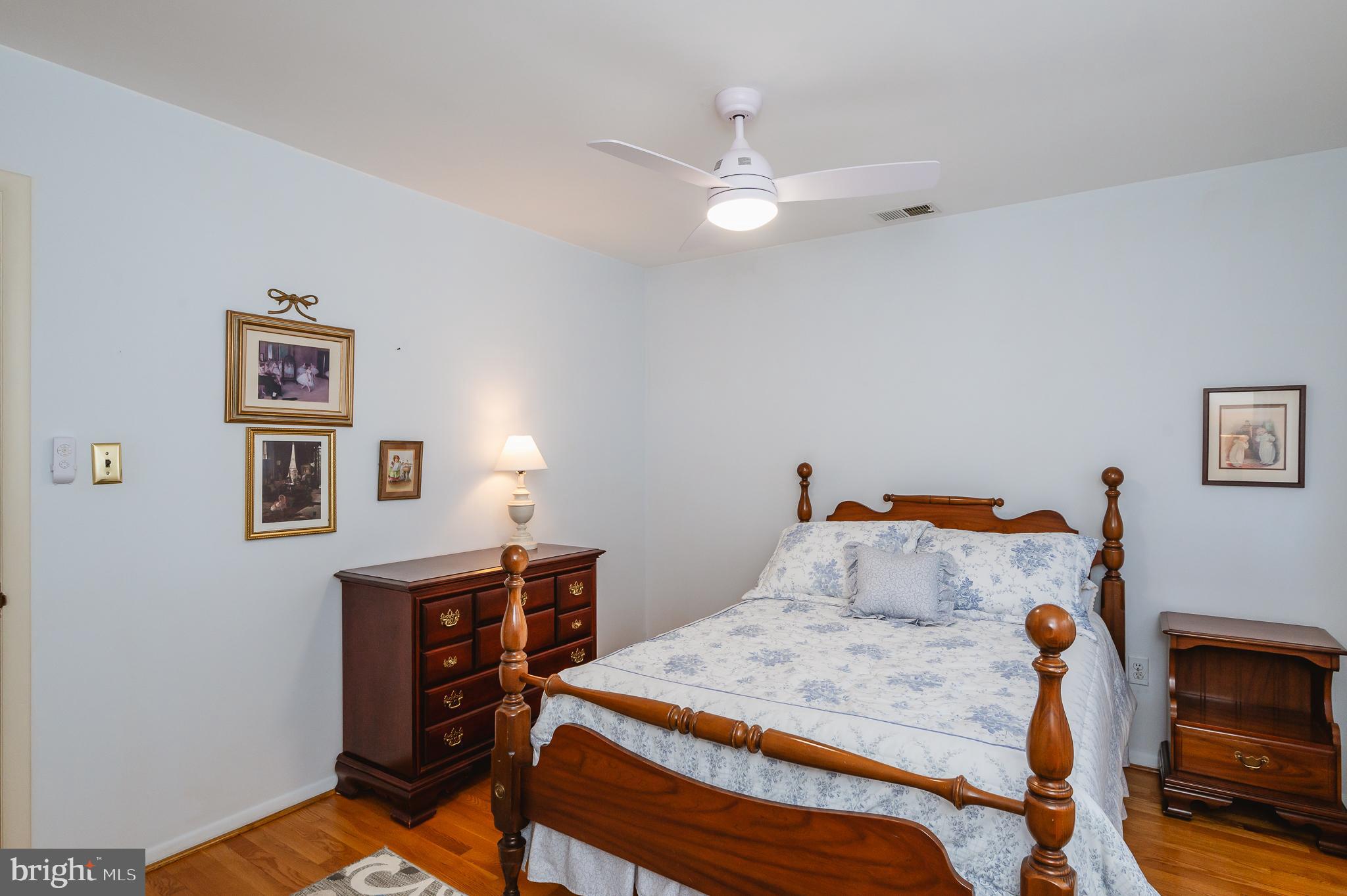 8337 Analee Avenue Rosedale, MD 21237 - Photo 23 of 48 a bedroom with a bed and a desk