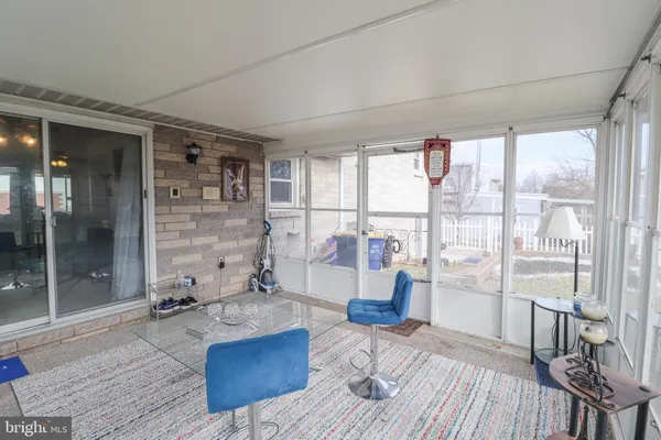 a kitchen with stainless steel appliances a stove a refrigerator and cabinets