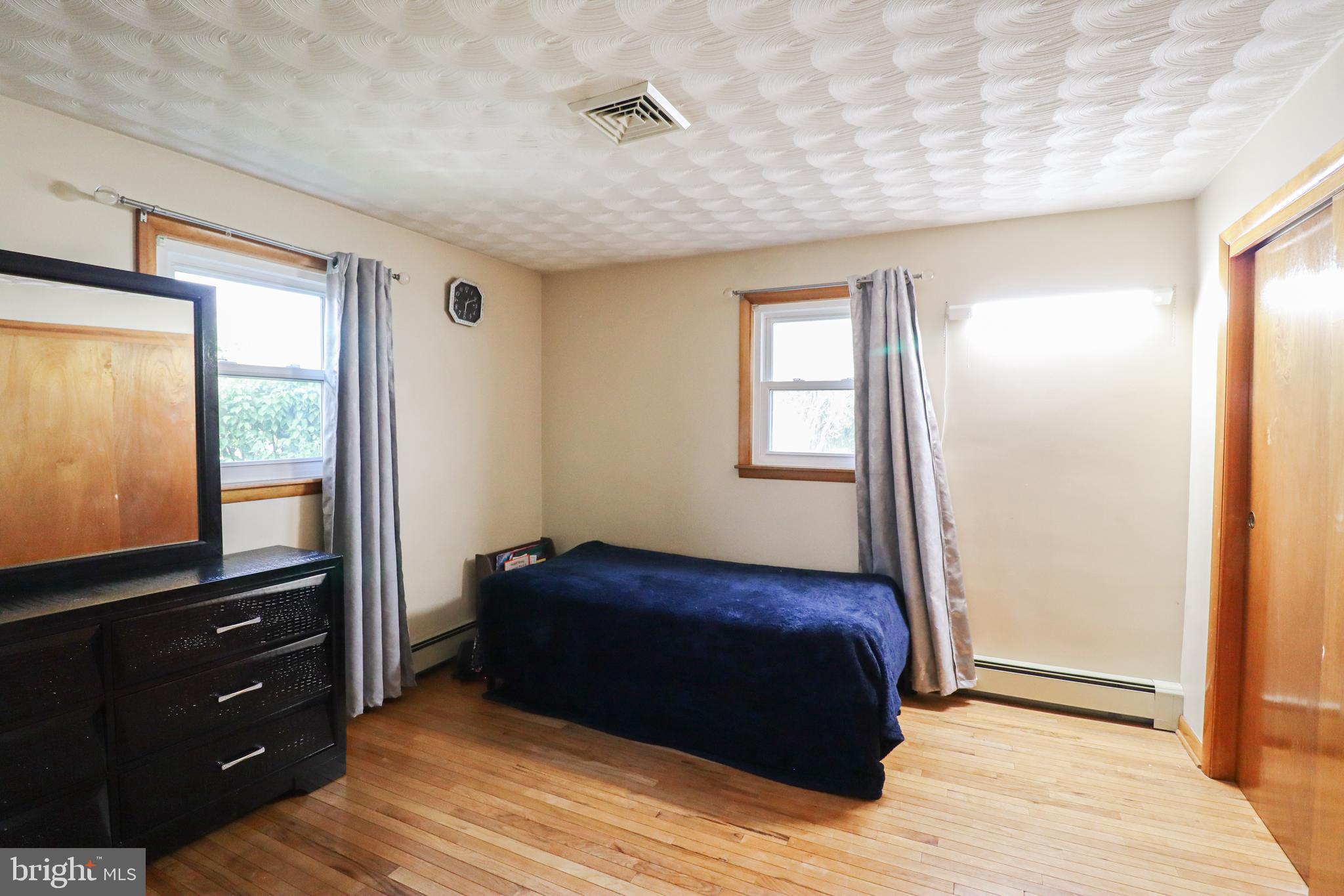 181 South Main Street Mount Wolf, PA 17347 - Photo 20 of 33 a bedroom with a bed and a window