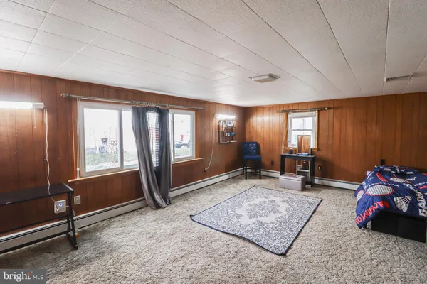 a kitchen with a refrigerator and sink