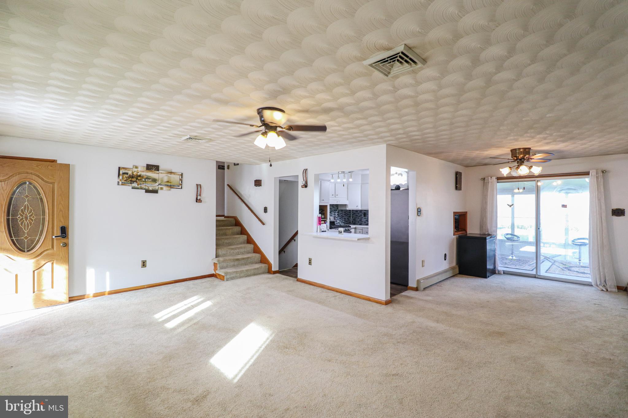 181 South Main Street Mount Wolf, PA 17347 - Photo 5 of 33 a view of a livingroom with a staircase