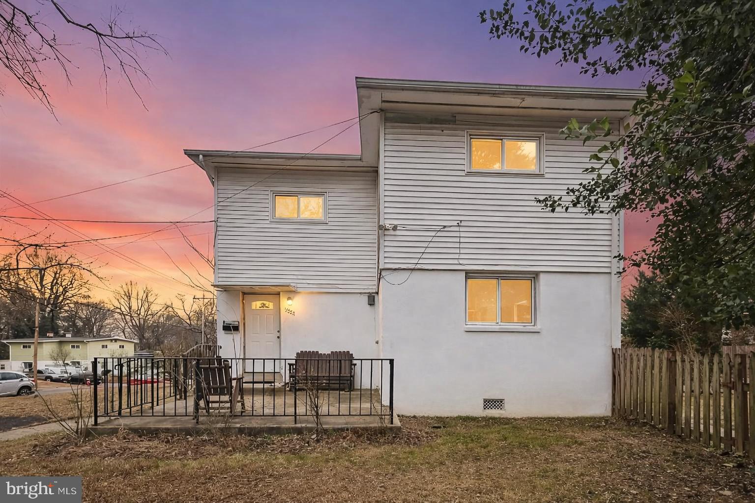 10725 Maple Street Fairfax, VA 22030 - Photo 7 of 42 a front view of a house with garden