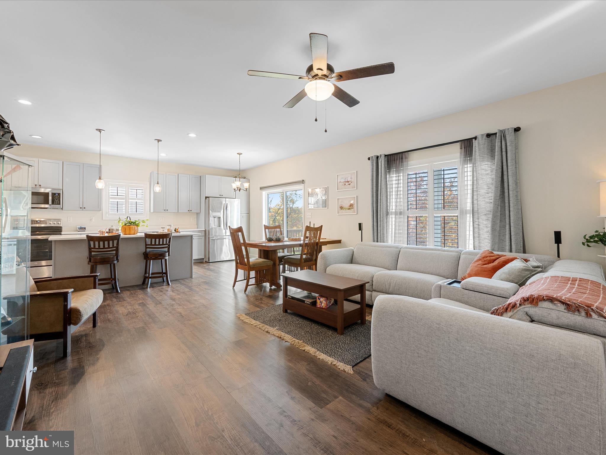 104 Larimar Lane Inwood, WV 25428 - Photo 19 of 57 a living room with furniture and a large window