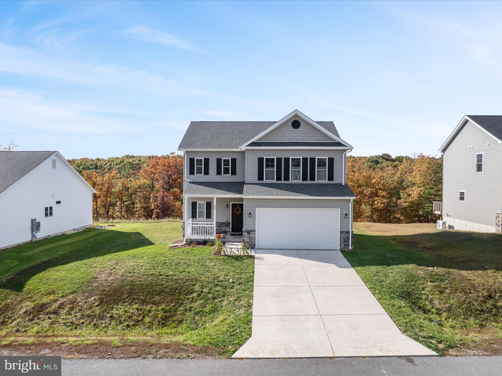 104 Larimar Lane Inwood, WV 25428 - Photo 2 of 57 front view of a house with a yard