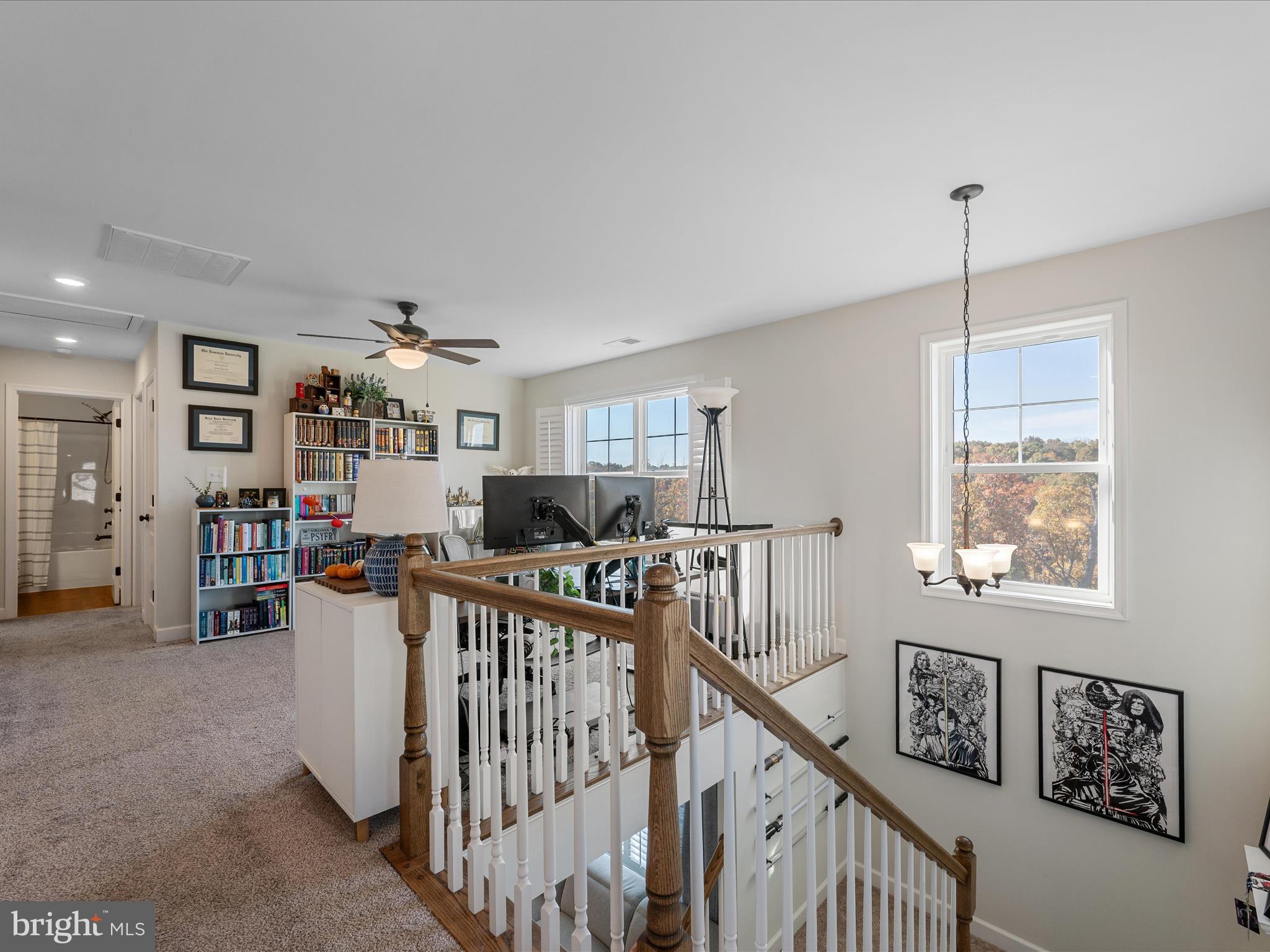 104 Larimar Lane Inwood, WV 25428 - Photo 22 of 57 a view of a livingroom with furniture and windows