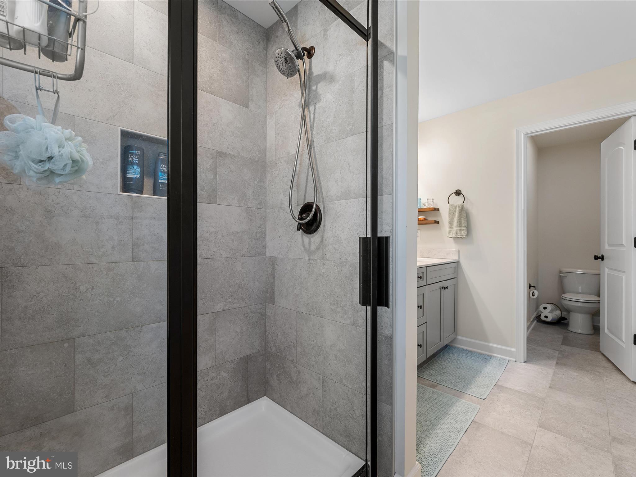 104 Larimar Lane Inwood, WV 25428 - Photo 27 of 57 a bathroom with a granite countertop shower