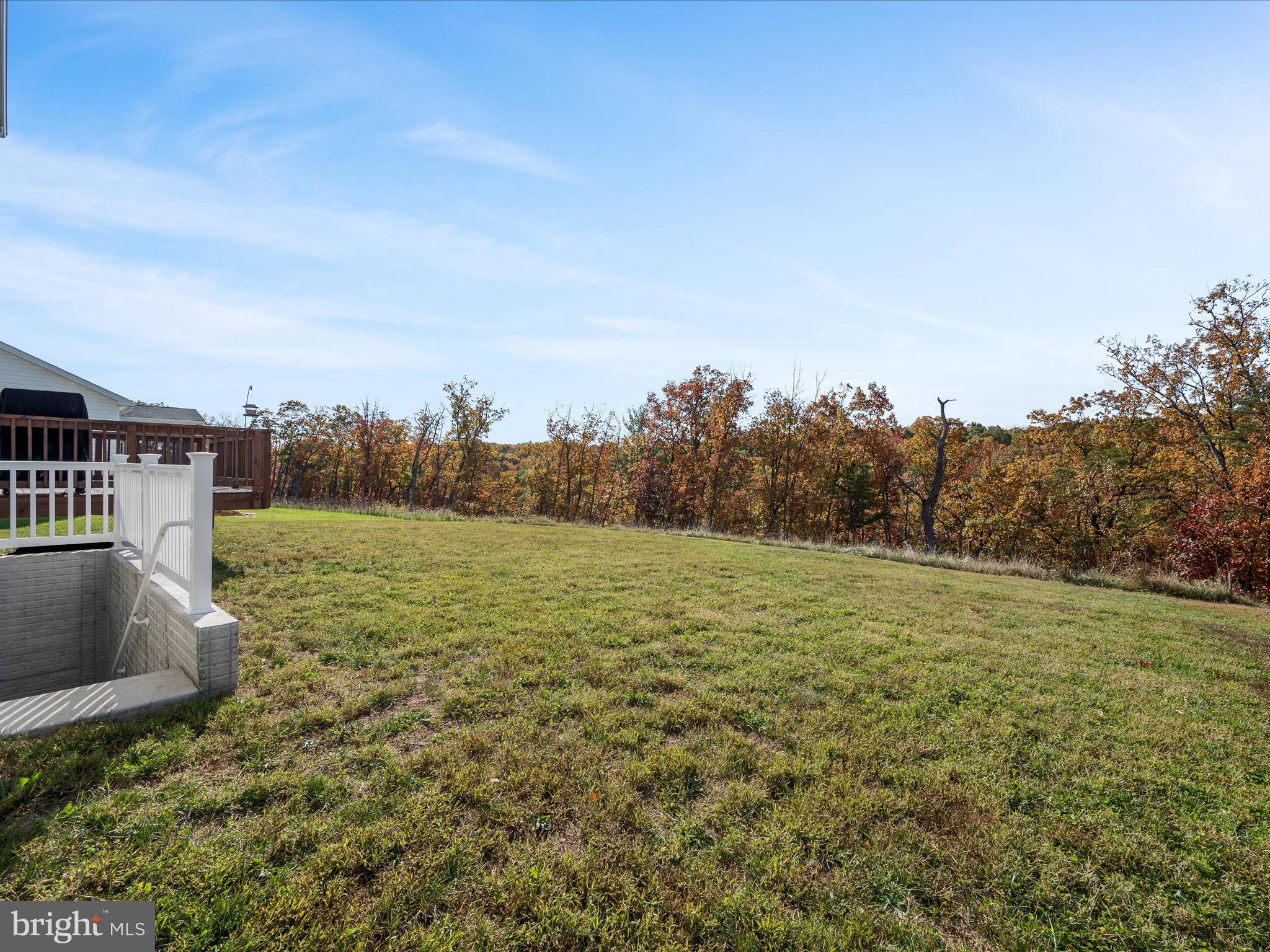 104 Larimar Lane Inwood, WV 25428 - Photo 39 of 57 a view of a field with an trees