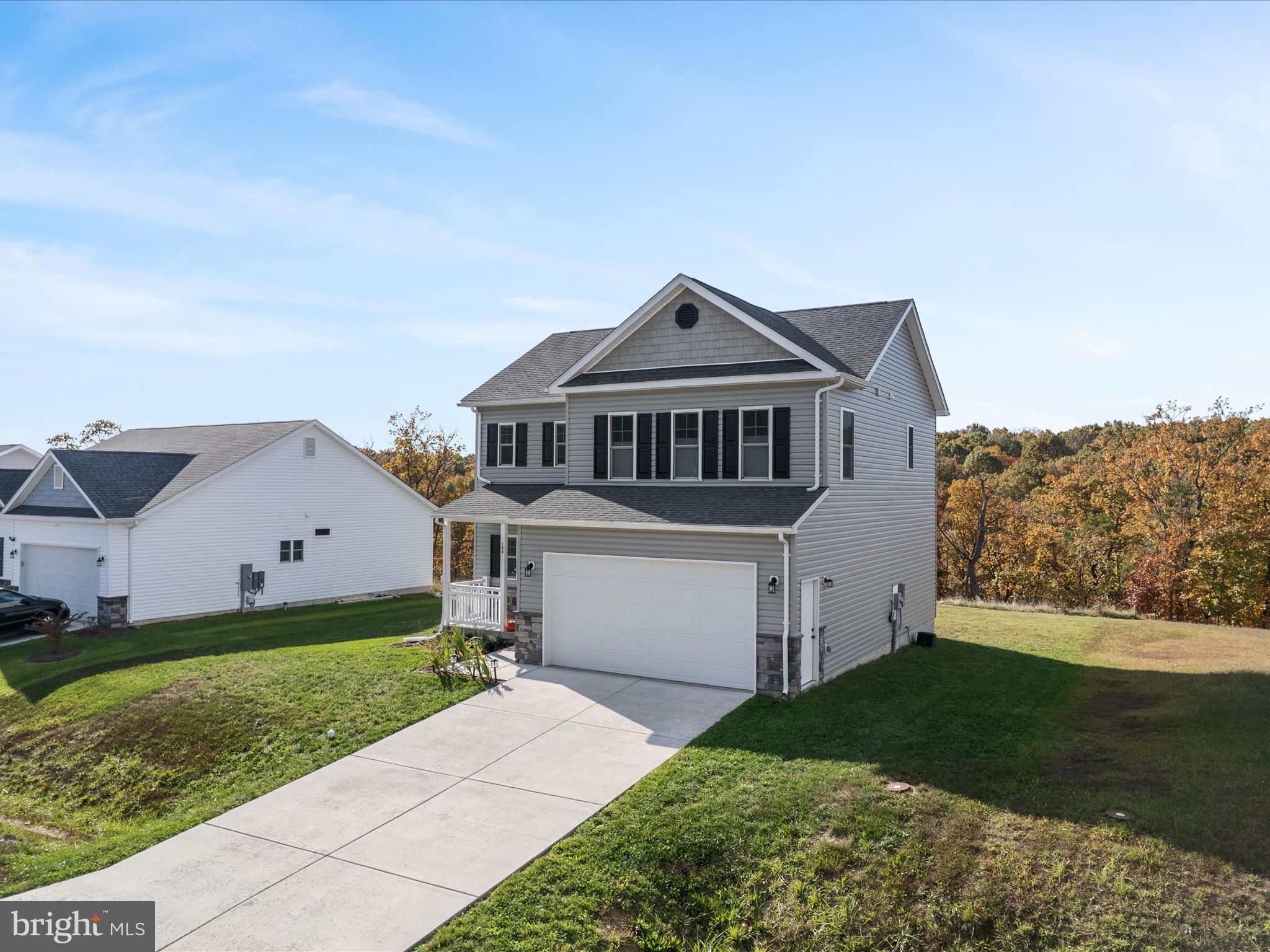 104 Larimar Lane Inwood, WV 25428 - Photo 44 of 57 a front view of a house with a yard