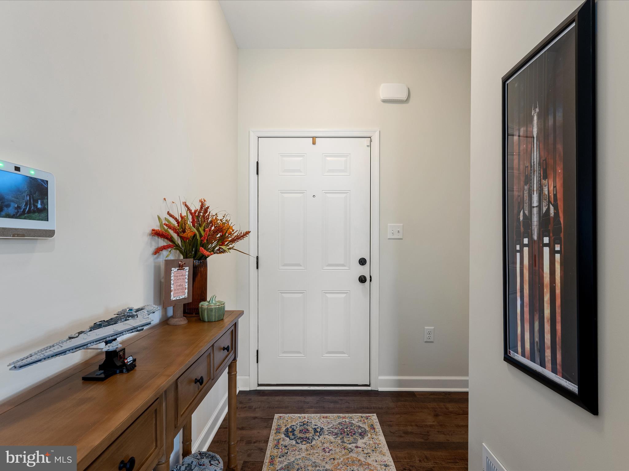 104 Larimar Lane Inwood, WV 25428 - Photo 8 of 57 a room with table and flowerpot