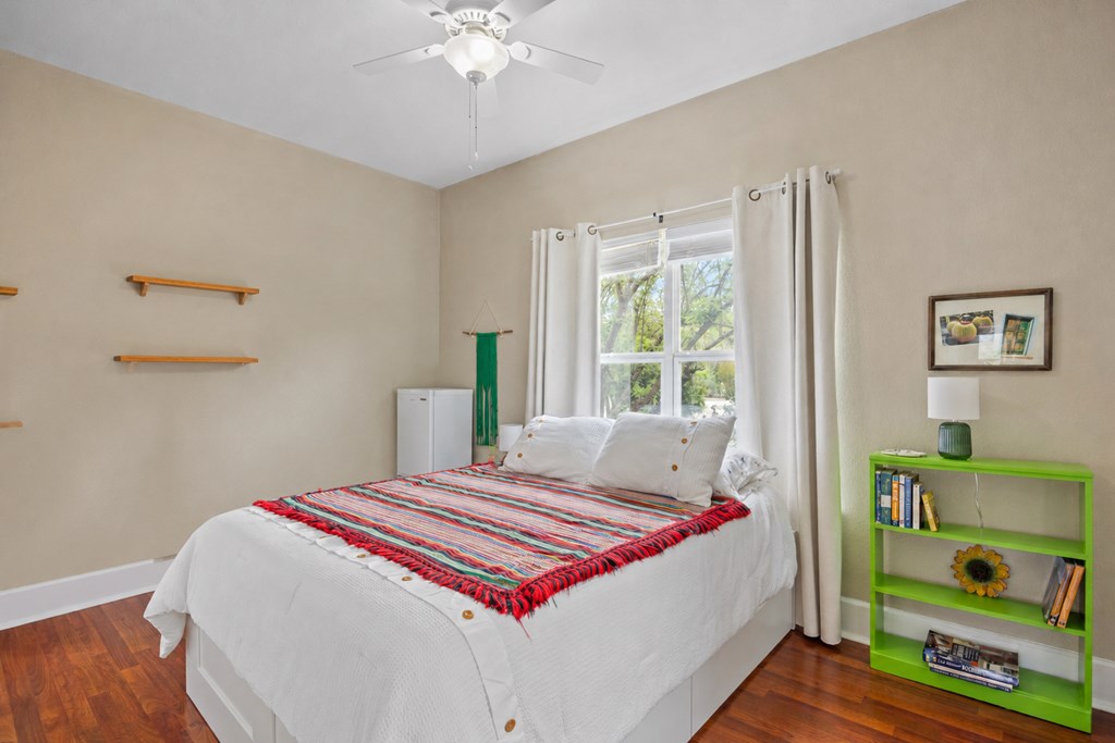 659 Town Creek Road Kerrville, TX 78028 - Photo 15 of 65 a bedroom with a bed and a window