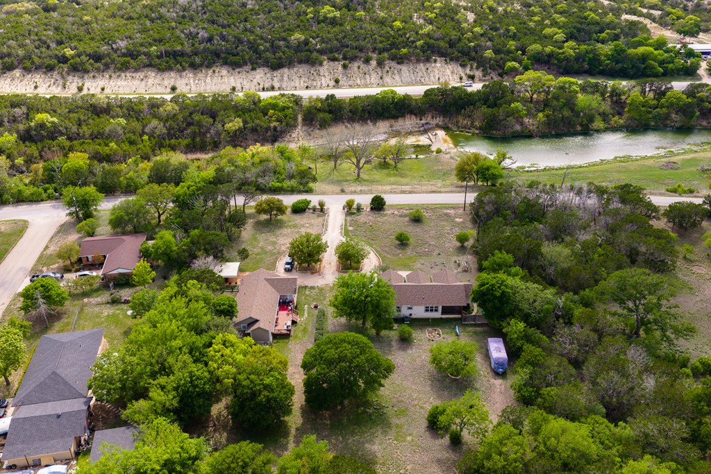 659 Town Creek Road Kerrville, TX 78028 - Photo 65 of 65 an aerial view of residential houses with outdoor space and lake view