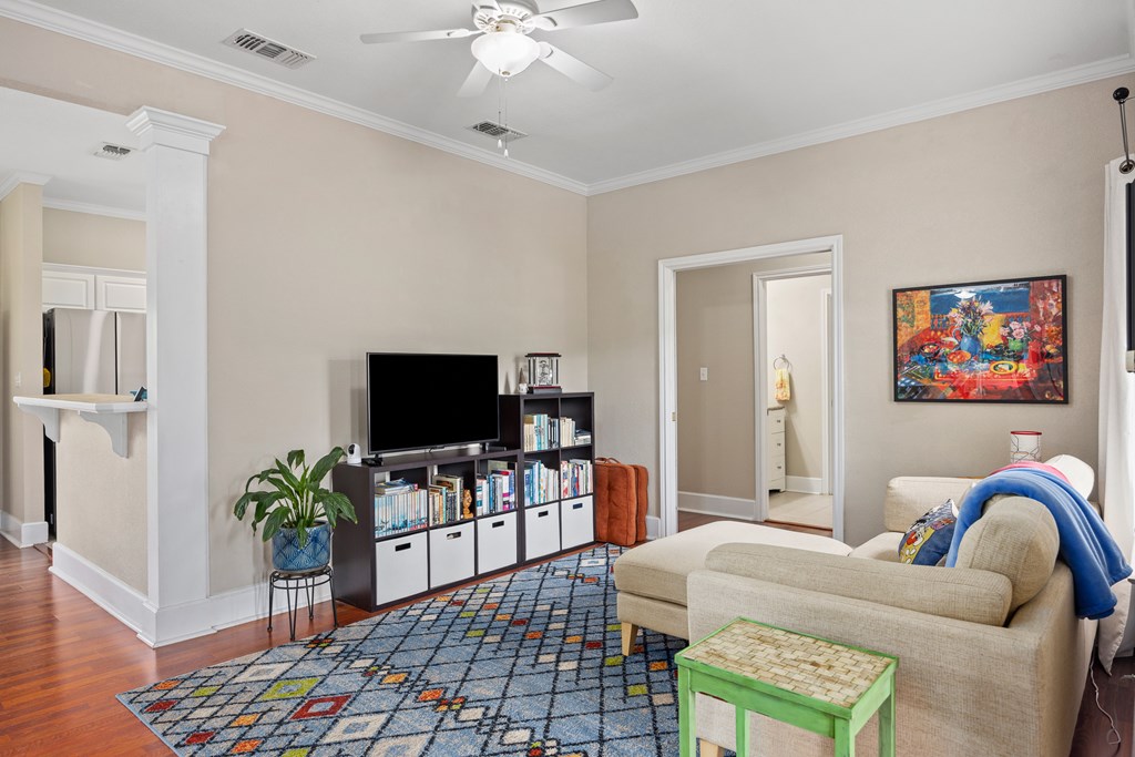 659 Town Creek Road Kerrville, TX 78028 - Photo 7 of 65 a living room with furniture and a flat screen tv