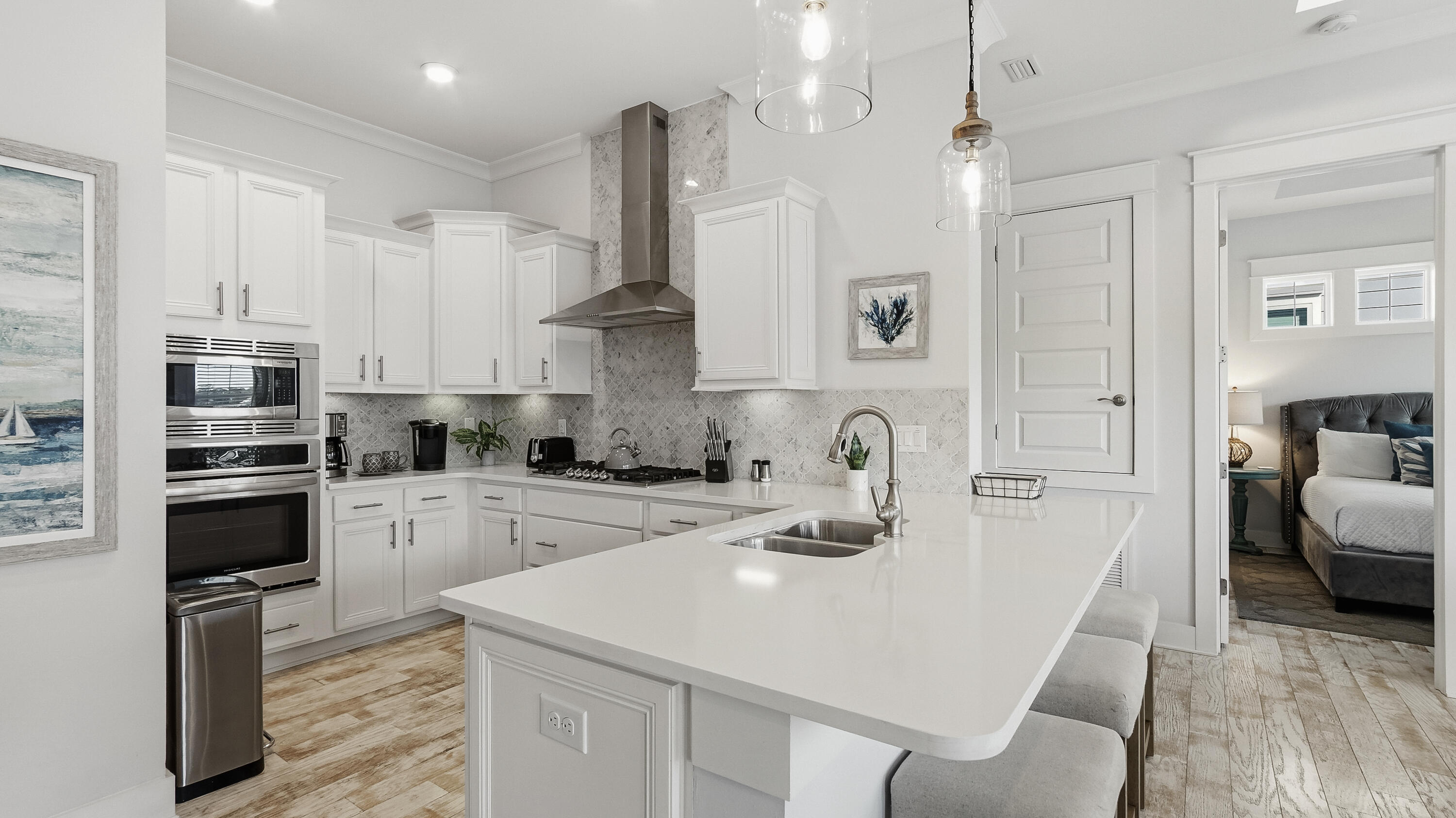 197 Milestone Drive, Unit C Inlet Beach, FL 32461 - Photo 11 of 72 a kitchen with stainless steel appliances granite countertop a sink a stove a refrigerator and island