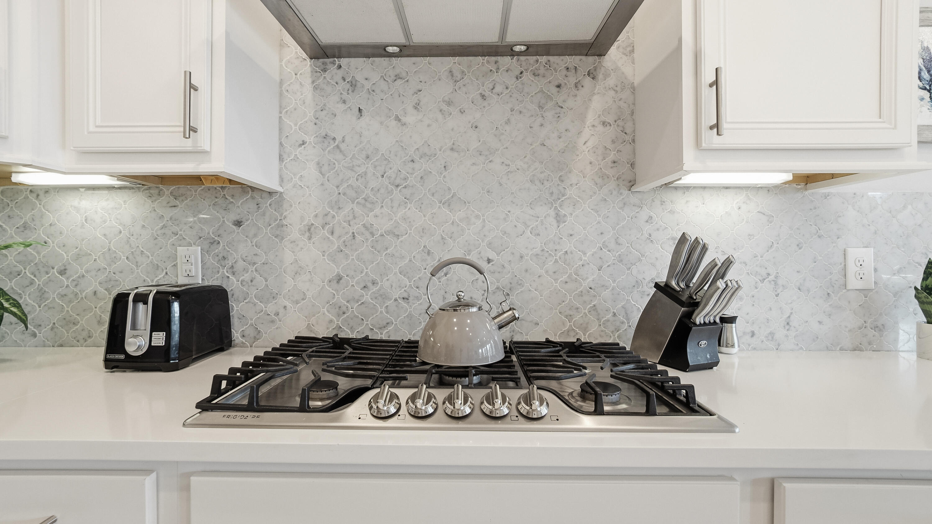 197 Milestone Drive, Unit C Inlet Beach, FL 32461 - Photo 13 of 72 a kitchen with a stove and cabinets