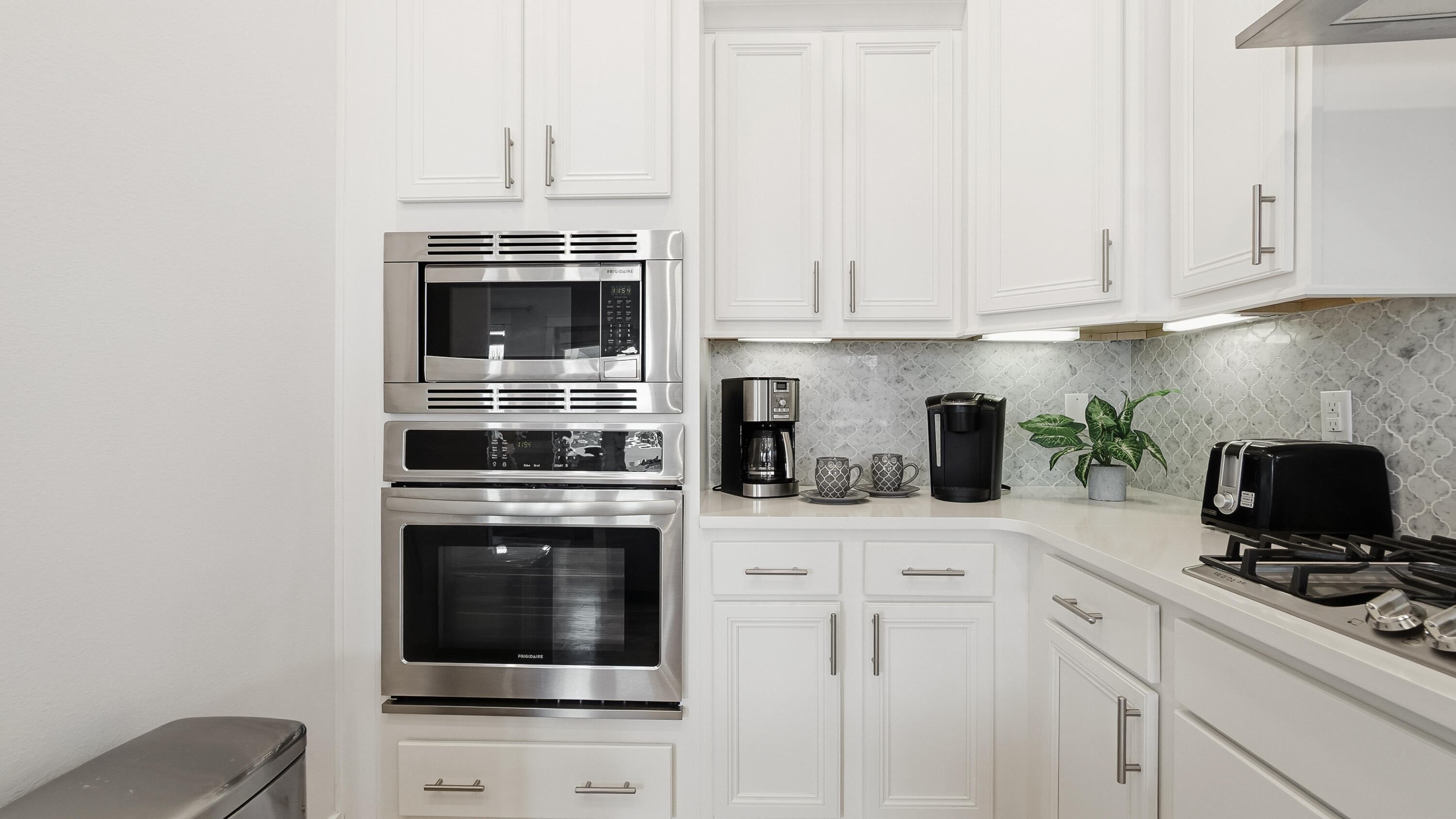 197 Milestone Drive, Unit C Inlet Beach, FL 32461 - Photo 15 of 72 a kitchen with granite countertop white cabinets and white appliances