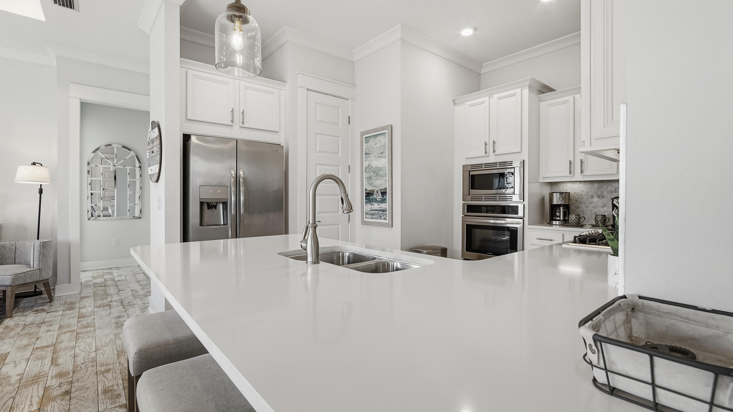 197 Milestone Drive, Unit C Inlet Beach, FL 32461 - Photo 20 of 72 a kitchen with stainless steel appliances kitchen island granite countertop a refrigerator and cabinets