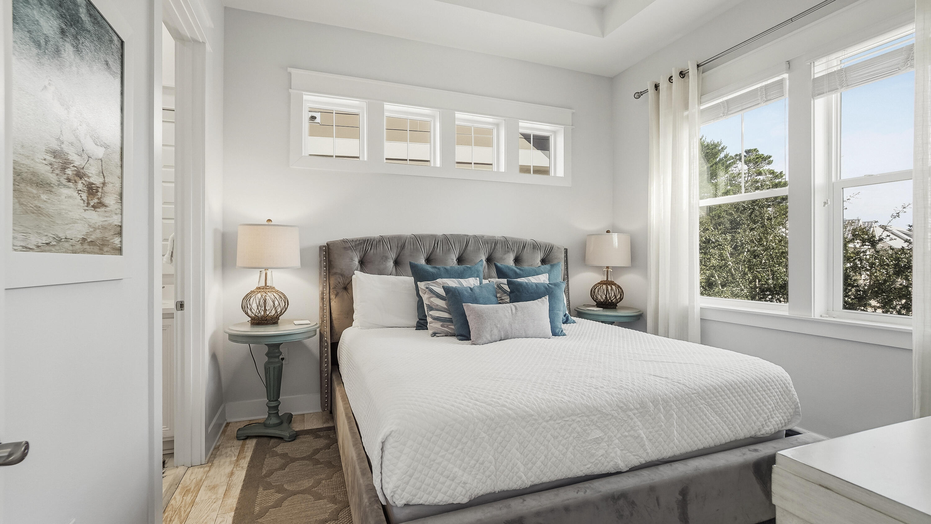 197 Milestone Drive, Unit C Inlet Beach, FL 32461 - Photo 21 of 72 a bedroom with a bed and a window