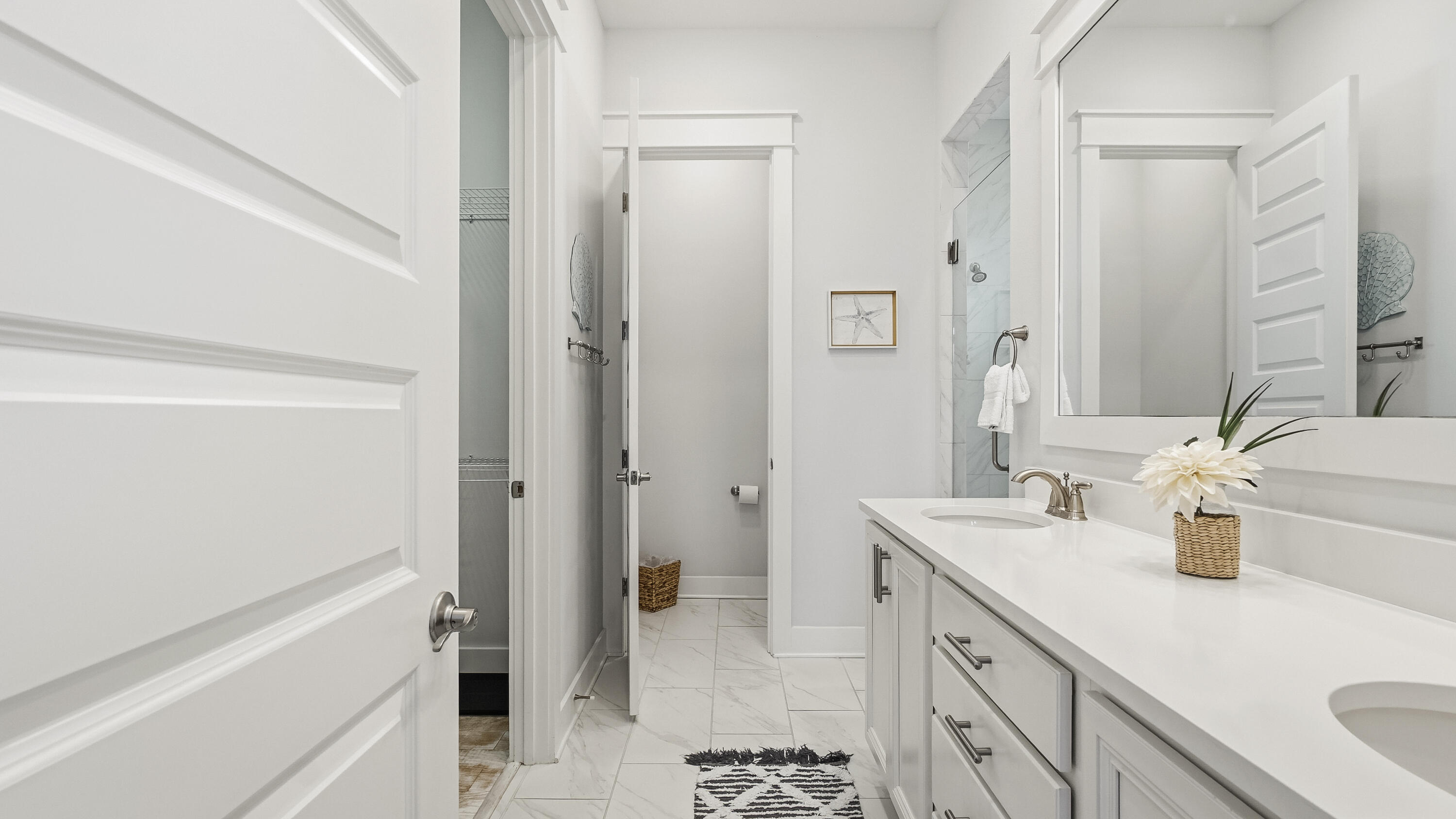 197 Milestone Drive, Unit C Inlet Beach, FL 32461 - Photo 26 of 72 a bathroom with a sink a toilet and shower