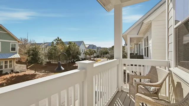 a view of a house with a window and balcony