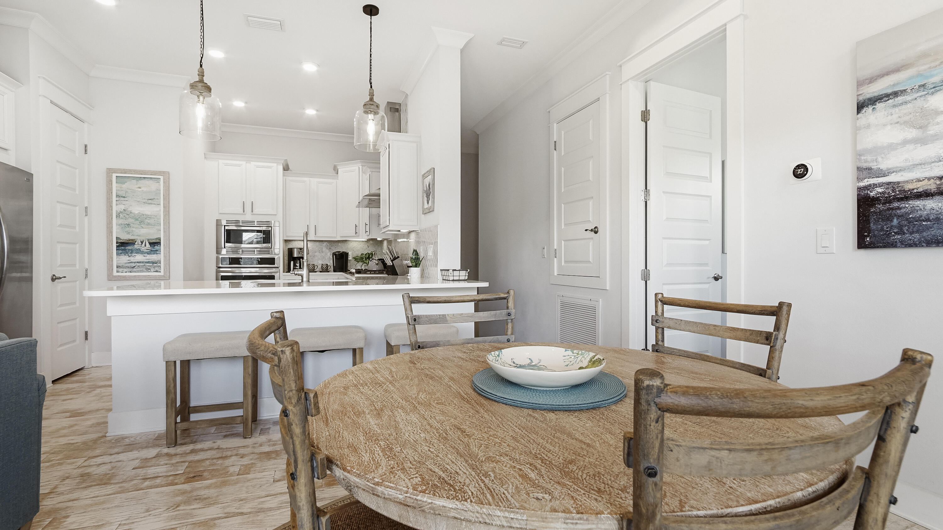 197 Milestone Drive, Unit C Inlet Beach, FL 32461 - Photo 6 of 72 a dining room with furniture and a floor to ceiling window