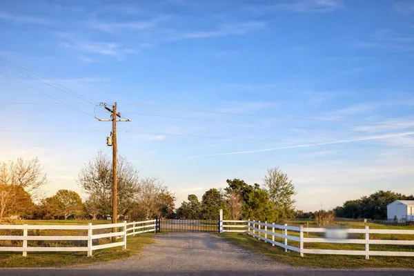 a view of a yard with an ocean view