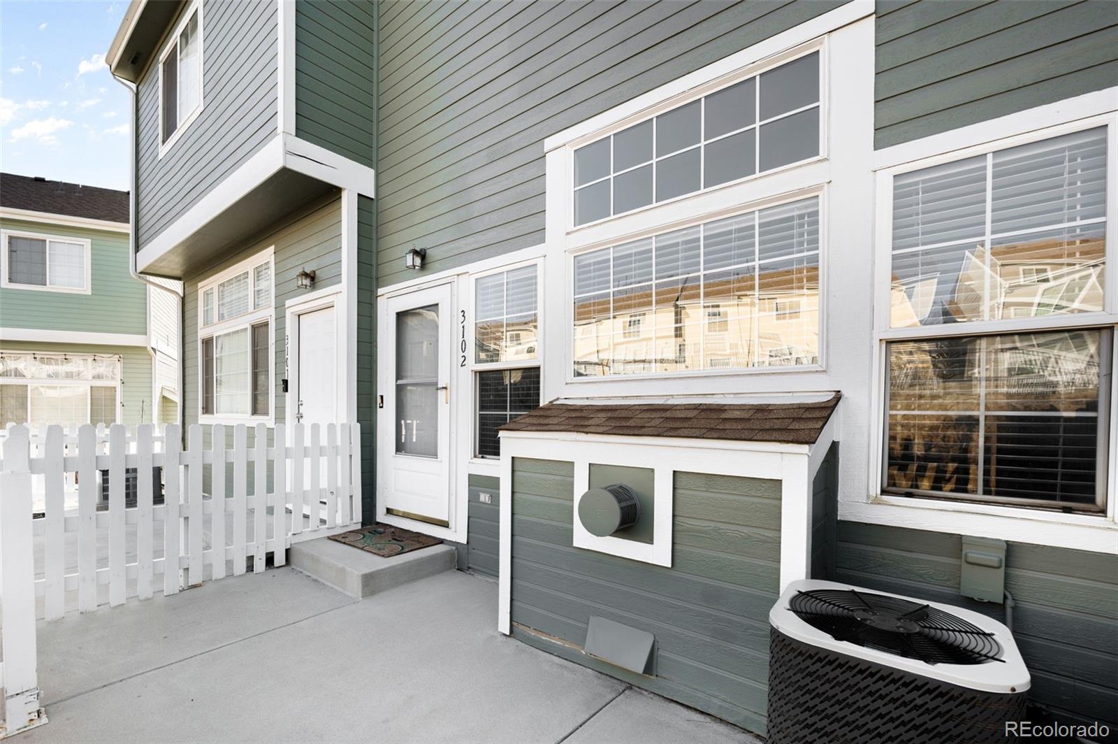 8199 Welby Road, Unit 3102 Denver, CO 80229 - Photo 9 of 18 a view of a house with a stove