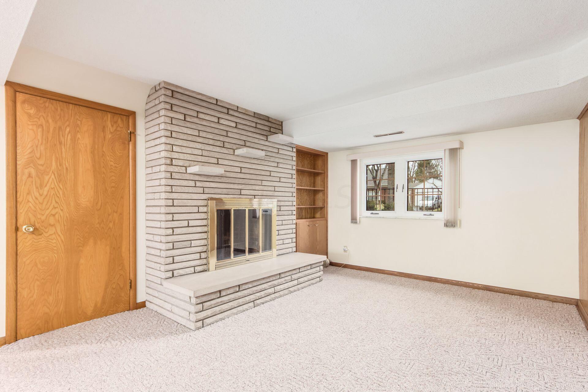753 Chaffin Ridge Columbus, OH 43214 - Photo 9 of 25 Relax by the fire in the family room...