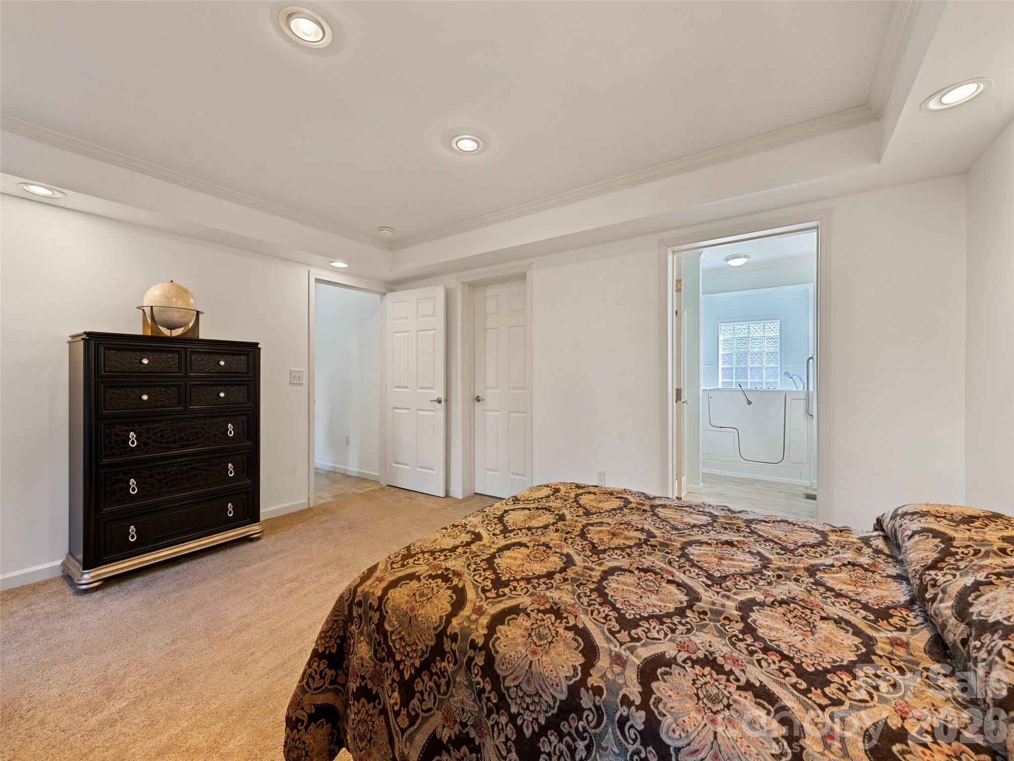 10 Enochs Way Fletcher, NC 28732 - Photo 16 of 24 a bedroom with a bed and a dresser