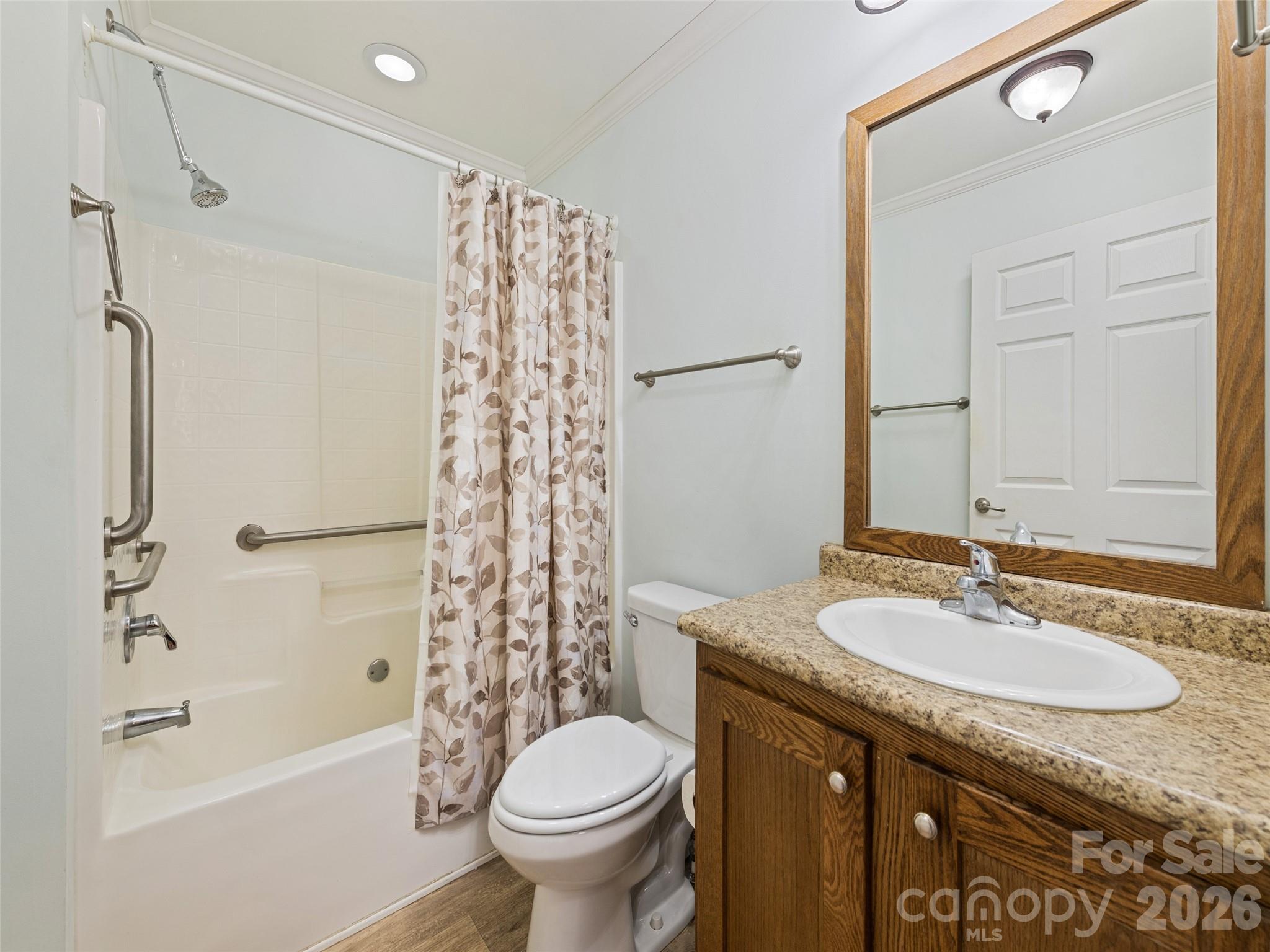 10 Enochs Way Fletcher, NC 28732 - Photo 17 of 24 a bathroom with a granite countertop sink toilet and shower